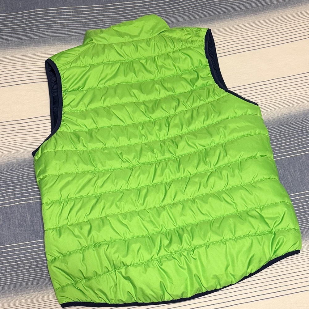 Women’s Nike Seahawks Navy and Green Reversible Puffer Vest - Picture 5 of 7